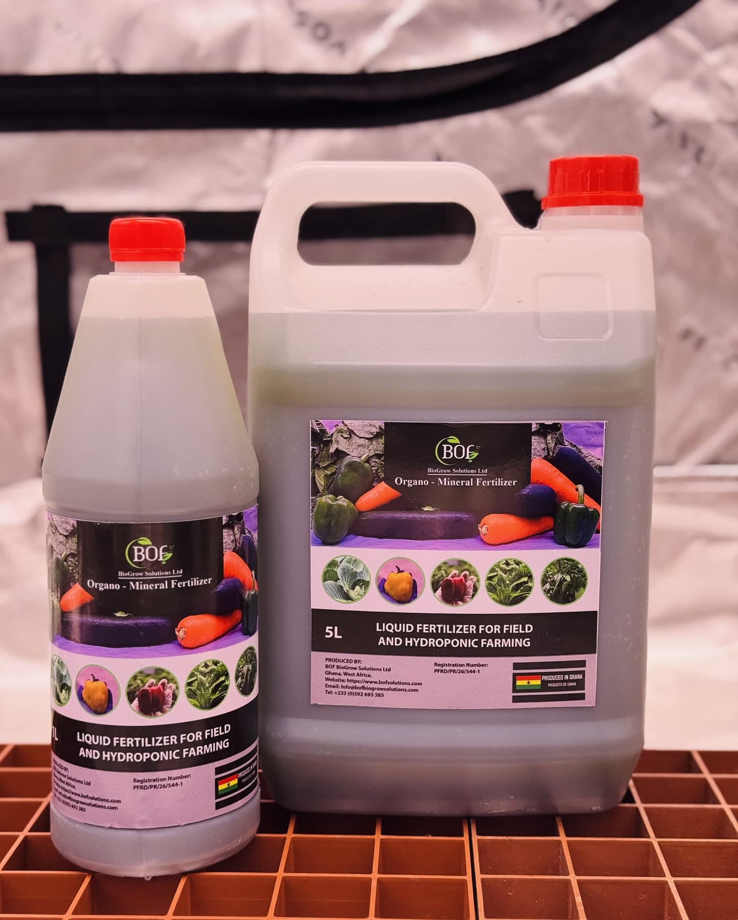 BOF organo-mineral fertilizer in a bottle and larger container